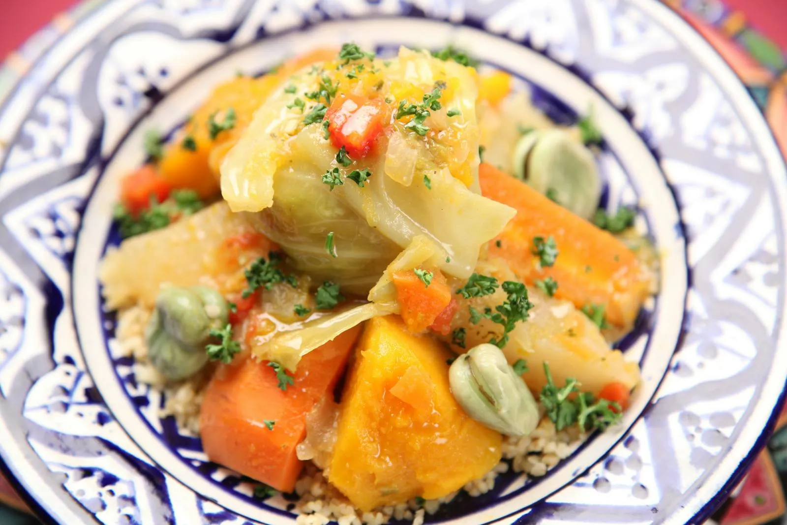 Traditional vegetable couscous on an ornate plate